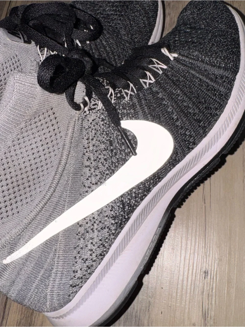 Nike Kids Black and Gray Flyknit High-Top Sneakers with White Swoosh